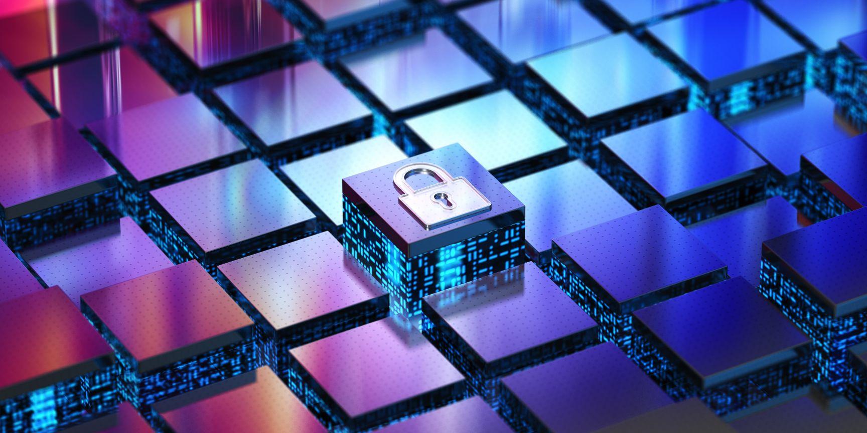 cube with a lock image as metaphor for cybersecurity insurance|man performing cybersecurity on his computer