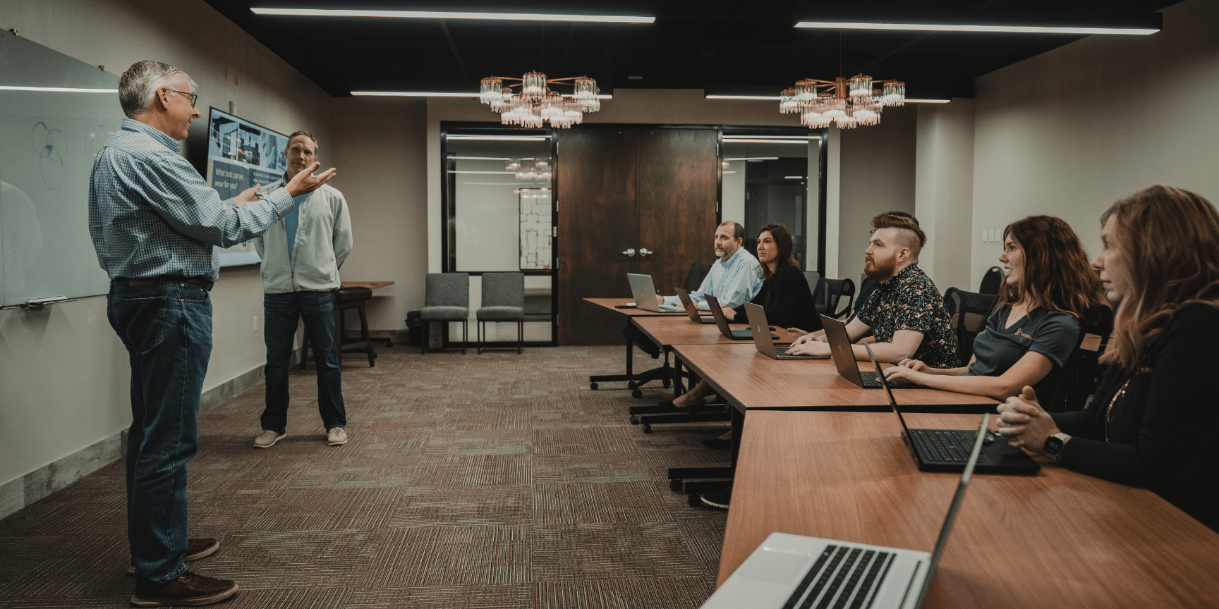 real business of IT how cios create and communicate value|Text saying Communicate IT Business Value with people talking below